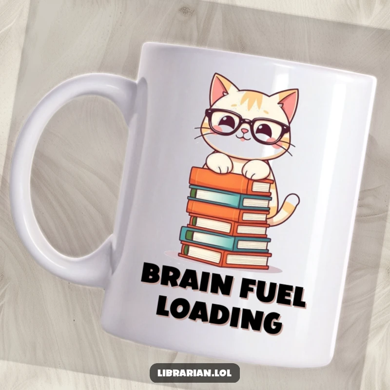 Funny mug features a smiling cat wearing glasses, precariously stacking a tall tower of books with focused determination.