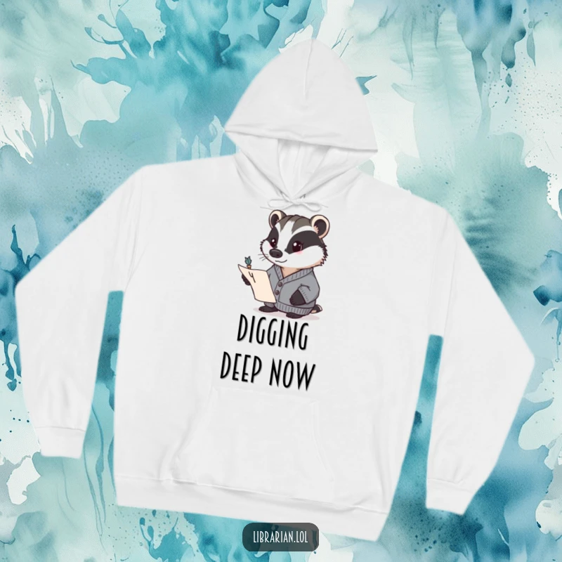 Funny badger in a cardigan, determinedly pointing to a page with a quill. Cozy and humorous hoodie, perfect funny gift.