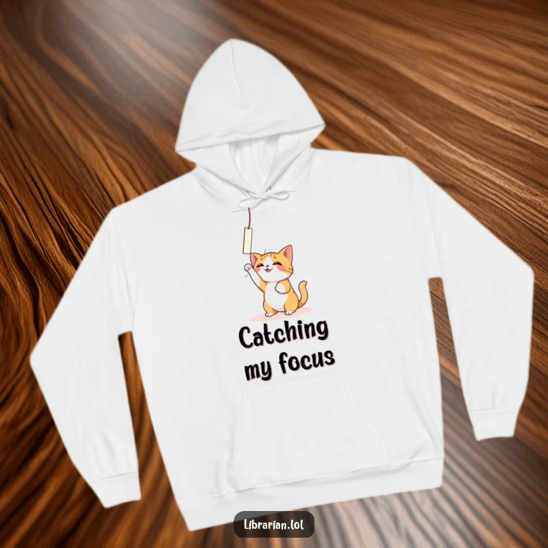 Funny Cat Bookmark Hoodie: A playful cat joyfully bats at a dangling bookmark.