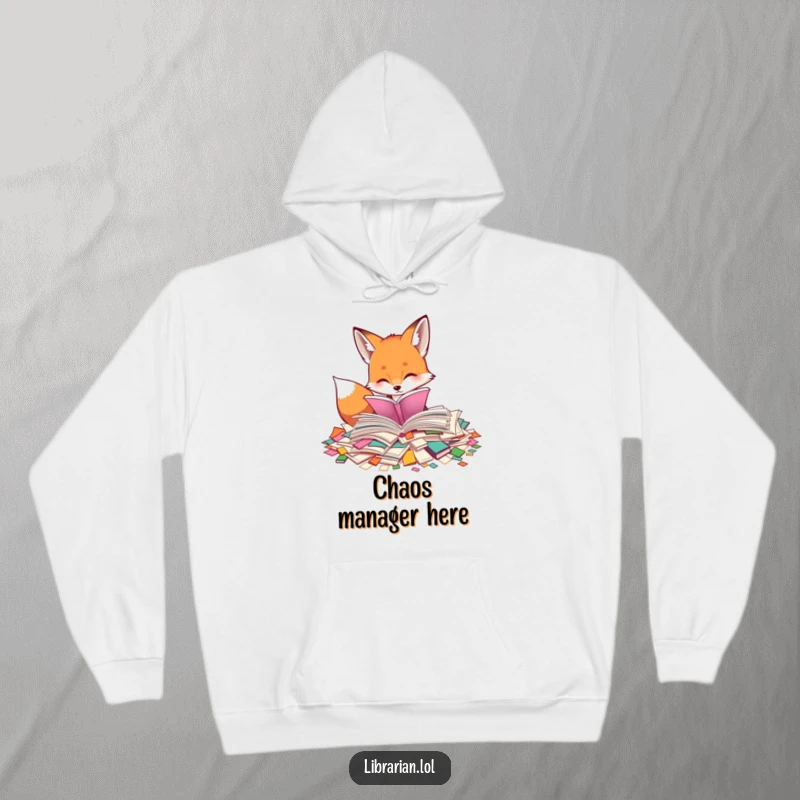 Funny hoodie featuring a curious fox diligently sorting through scattered book pages. Cozy and humorous clothing for passionate readers.