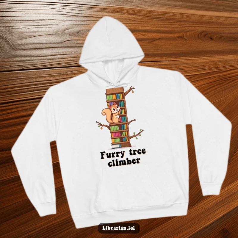 Funny squirrel climbing a towering bookshelf like a tree, a cozy hoodie for playful book lovers and adventurers.