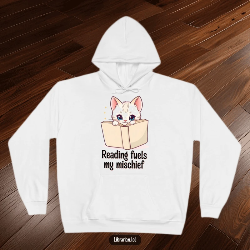 Funny Hoodie depicting a cute cartoon kitten peeking around a book with a sparkly, mischievous gaze, ideal for book lovers.