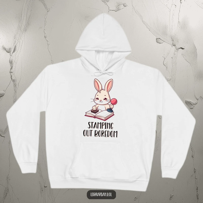 Funny determined bunny stamping a book with a stamp pad, featured on a warm, comfortable hoodie for neat freaks.