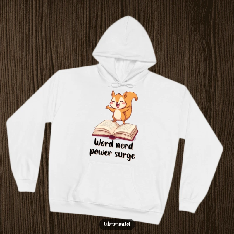 Funny Squirrel Hoodie, happily bouncing on an open dictionary, blending warmth with literary humor, perfect for cozy reading sessions.