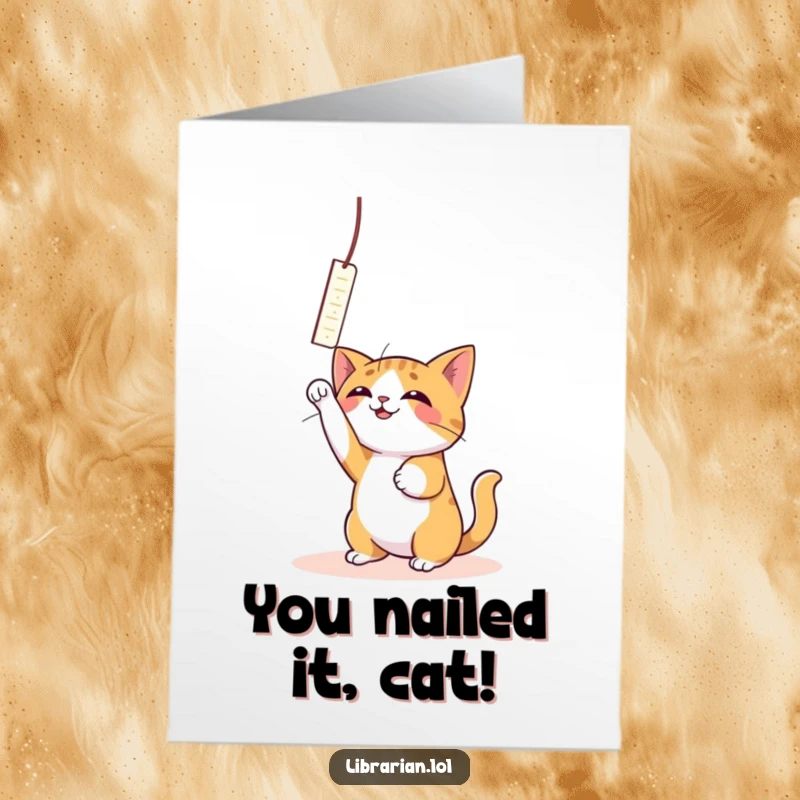 Funny Free Printable Congrats Card: A joyful cat energetically bats at a dangling bookmark, celebrating your successful achievement.
