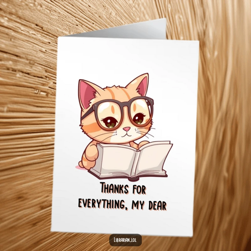 Funny Free Printable Thank You Card: A cute cat in reading glasses intently reads a book, conveying a wise thank you.