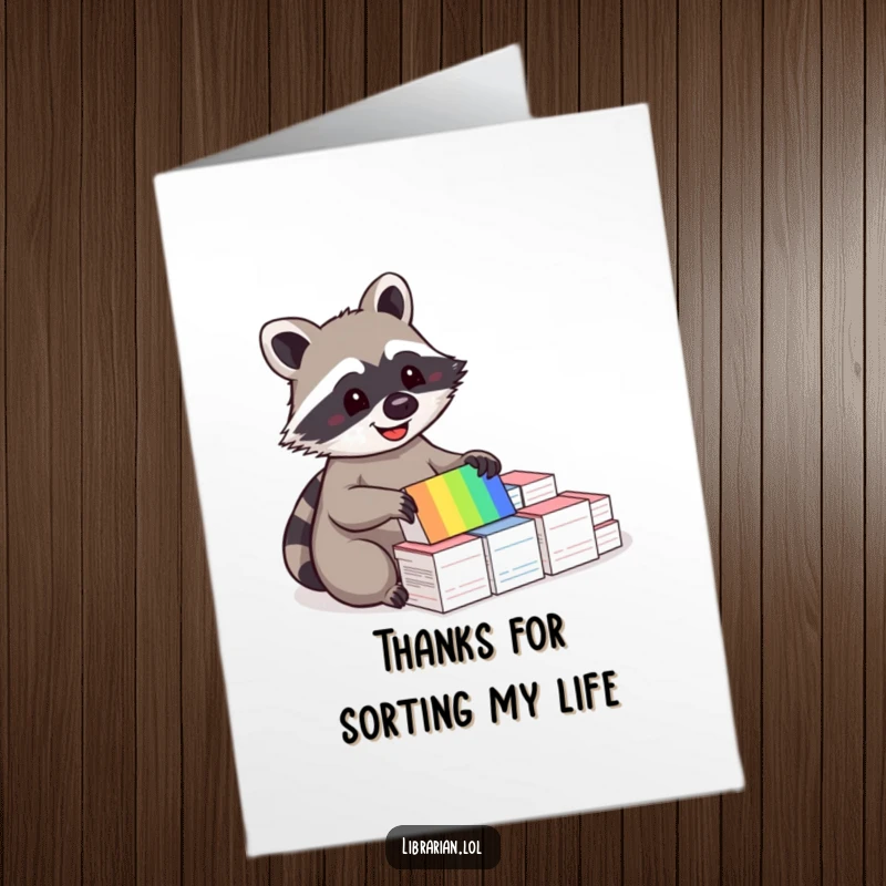 Funny Free Printable Thank You Card: A happy raccoon sorts index cards with delight, showing organized appreciation.