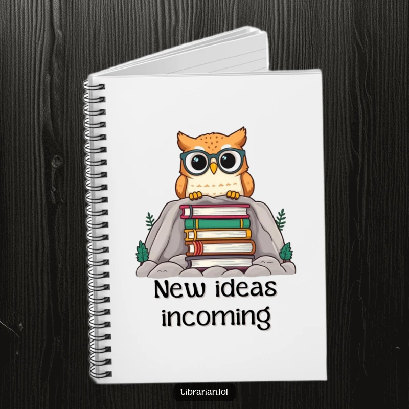 Funny owl wearing spectacles peeking from behind a large stack of books, printed on a notebook for jotting down wise thoughts.