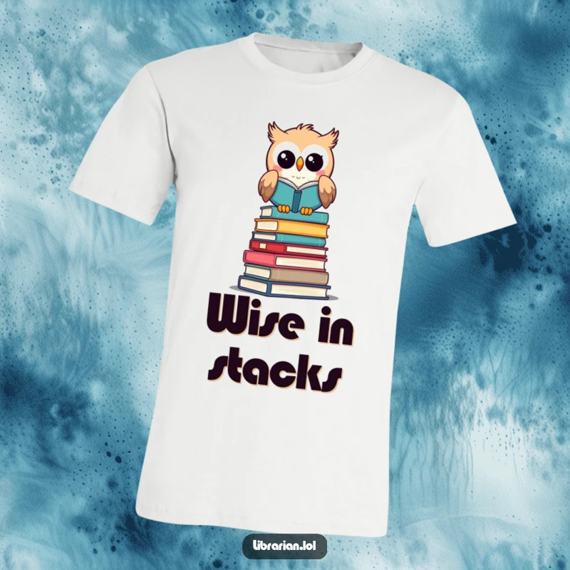 Funny t-shirt: A happy owl librarian sits on a book stack, surveying, a perfect funny gift.